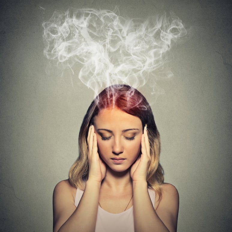 Portrait young stressed woman thinking too hard steam coming out up of head isolated on grey wall background. Face expression emotion perception.jpeg